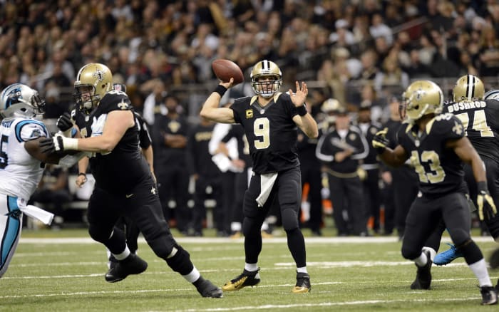 Dec 30, 2012; New Orleans Saints quarterback Drew Brees (9) passes against the Carolina Panthers. John David Mercer-USA TODAY Sports